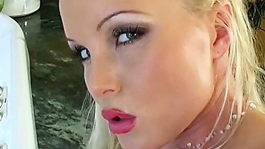 Horny blonde finger fucks herself then shoves a dildo in her cunt