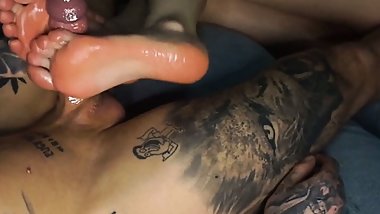 POV she is giving a sideways FOOTJOB & i explode between her FEET